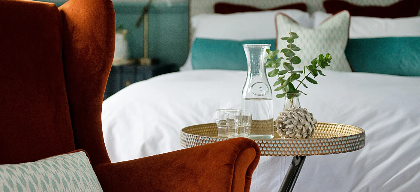 Roseville-House-Youghal-Accommodation-The-Garden-Suite-table-water-bottle-chair